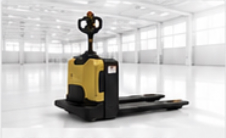 Electric pallet truck in a bright warehouse